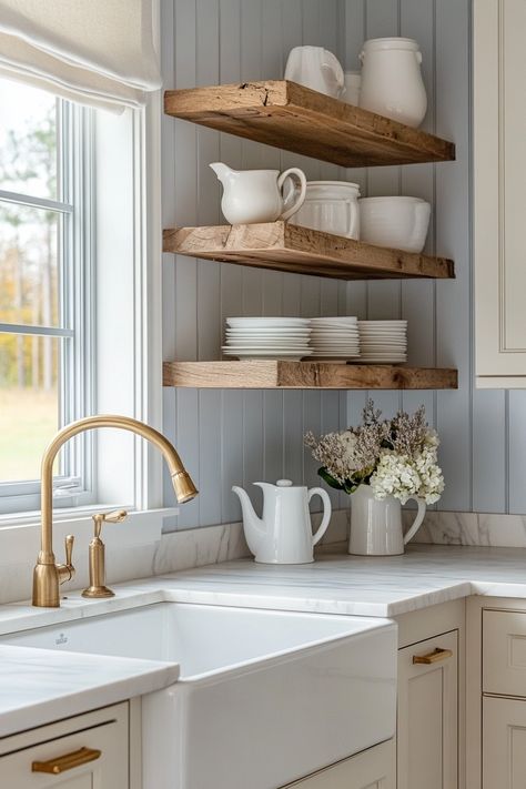 Discover the charm of the latest kitchen designs with this modern farmhouse look. Elegant open shelving complements the sleek brass fixtures for a timeless style. Perfect blend of rustic and contemporary! #HomeDecor #KitchenInspiration #ModernFarmhouse Kitchen Cabinets Open Shelves, Summerhouse Kitchen, Farmhouse Kitchen Open Shelving Ideas, Rustic Kitchen Design Inspiration, Open Shelves, Minimalist Cottagecore Kitchen, Kitchen With Open Shelving And Cabinets, Open Shelves Kitchen, Modern Country Kitchen