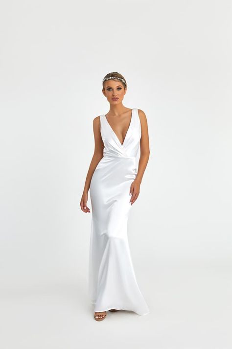 NICOLE BAKTI STYLE #7035. <div class="product-detailed-description theme-typo"> <p><span style="color: #000000; font-family: 'Helvetica Neue'; font-size: small;">Looking for a dress that will make you simple in appearance yet lovable and fashionable? Look no further. Designed with attention to details using the best of high-quality fabric, this full-length dress is breathable, comfortable, and durable. This gown will highlight your curves. Also, the deep v-neckline and back will accentuate your beautiful shoulders and back. The soft cape attached to the back, just above the waist, puts the icing to the dress. Add to cart today.</span></p> </div> <div class="expandable-block-overlay" style="display: block; width: 100%; height: 29px; position: abs Beautiful Shoulders, Nicole Bakti, Helvetica Neue, Full Length Dress, Satin Gown, Brand Collection, Font Family, Formal Gowns, Font Size