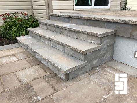 See how SilcaGrates were used to create beautiful stone steps easily.   Obtain the desired rise and tread with no worries of settling over time. 
Welcome to the Deck Revolution! Paver Porch Steps, Stone Steps Back Door, Steps From Porch To Patio, Diy Stone Steps Front Door, Patio Stone Steps, Front Steps Ideas Stone, Steps Off Back Door To Patio, Patio Paver Steps, Concrete Porch Steps Ideas