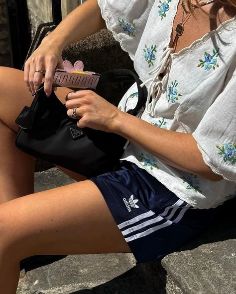 Rebecca Olivia | It’s an Adidas shorts kinda summer 💙 Summer fashion, summer outfit, summer inspo, outfit ideas, outfit inspo | Instagram Sport Short Outfits, Summer Outfits 2024 Aesthetic, Blue Adidas Shorts Outfit, Adidas Shorts Outfit Summer, Shorts For Summer, Adidas Shorts Women Outfit, Adidas Shorts Outfit Aesthetic, Adidas Shorts For Spring Streetwear, Adidas Summer Beach Shorts