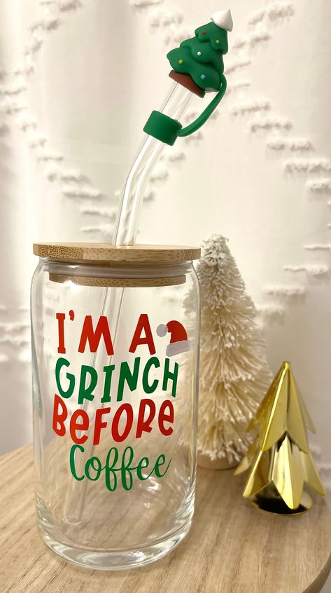 I'm a Grinch before Coffee Libby Glass can Makes the perfect gift for any holiday lover or perfect for everyday use!  Sip in style and embrace the season with the most durable & high-quality glass cup. 🎄 Includes:  1 Libby Glass Cup w/ permanent vinyl lettering.  *Vinyl is water resistant, but please hand wash only. Do not soak, or put in dishwasher.  -Comes with bamboo lid & glass straw + straw cleaner. -16oz thick glass -Fits in cup holders -Care card instructions on how to take care of your Cricut Vinyl Cups, Christmas Cups Vinyl Cricut, Cricut Christmas Cups, Christmas Glass Cup Ideas, Cricut Coffee Mug, Libby Glass Cup Designs, Christmas Mug Vinyl, Winter Cups Design, Glass Cup Vinyl Ideas