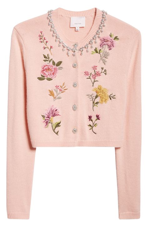 Floral embroidery, sparkling crystals and pearly beads make an enchanting statement on a lightweight, wool-enriched cardigan. 18 1/2" length (size Medium) 6mm pearls Front button closure Crewneck Long sleeves 70% acrylic, 30% wool Dry clean Imported