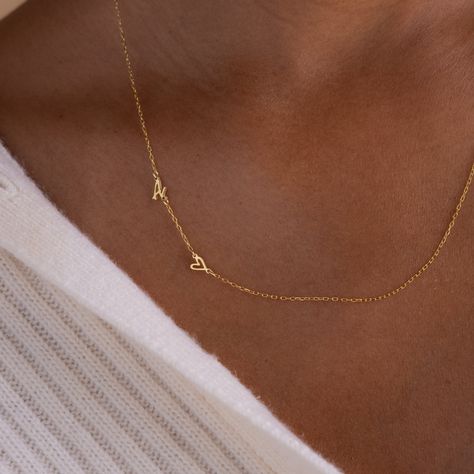 Add a touch of personal elegance to your attire with our Sideways Initial Heart Necklace, a beautifully designed piece that blends a heart-shaped pendant with your chosen initial. Crafted with precision and attention to detail, it's a versatile accessory that symbolizes love and individuality ♡ Material: High Quality Solid 925 Sterling Silver Finish: Sterling Silver ∙ 18K Gold ∙ Rose Gold Dimension: 7mm letter height Design will come in all capital letters unless specified otherwise Size: The to Satellite Necklace, Boyfriend Initials, Initial Tag Necklace, Letter Necklace Initials, K Necklace, Initial Heart Necklace, Promise Necklace, Fingerprint Necklace, Sideways Initial Necklace