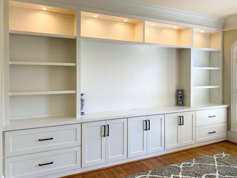 Built In Shelves With Baseboard Heat, Built In Shelves Master Room, Entertainment Center Ideas Basement, Custom Made Entertainment Center, Built In Cabinets With Bookshelves, Den Built Ins With Tv, Family Room Cabinets Ideas, Tv Room Cabinets Built Ins, Media Center Bookshelves