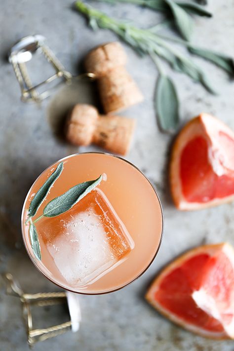 Grapefruit and Sage Champagne Cocktails | www.floatingkitchen.net Champagne Cocktails, Champagne Cocktail, Pretty Drinks, Milkshakes, Summer Cocktails, Party Drinks, Simple Syrup, A Drink, Cocktail Drinks