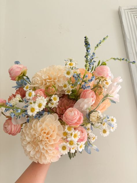 ❤The bouquet with colorful (light blue, pastel pink, white, peach) faux flowers in many types, some of which are real touch flowers.  They are perfect for spring or summer weddings~~  ❤Matching bouquets, boutonnieres... All matching items are available, please message us for a quote, we would love to work with your budget and do custom wedding packages just for you  ❤Change flower colors If you love this bouquet but want different colors, please send me a message, and we'd be happy to provide a Bouquet Of Flowers Spring, Wedding Boquetes Of Flowers Aesthetic, Pink Peach Bouquet, Light Pink And Purple Bouquet, Dalia Wedding Flowers, Wildflower Bouquet Spring, Lotus Flower Wedding Bouquet, Baby's Breath Bouquet Wedding, Pastel Pink Wedding Flowers