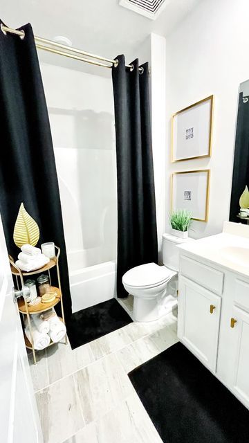 Half Bathroom Ideas Black And White, Black Modern Bathroom Decor, Dark Colored Bathrooms, Restroom Wall Decor Ideas, Bathroom Rental Makeover, Black White And Gold Bathroom Ideas, Black And White Apartment Bathroom, Beige And Black Bathroom Ideas, Black And Gold Bathroom Decor Ideas