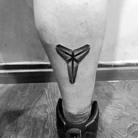 Kobe Bryant Symbol Back Of Leg Tattoos For Gentlemen Kobe Bryant Logo Tattoo, Mamba Mentality Tattoo, Kobe Bryant Tattoo, Kobe Tattoo, Wanderlust Tattoos, Peru Tattoo, Kobe Logo, Basketball Tattoos, Back Of Leg Tattoos