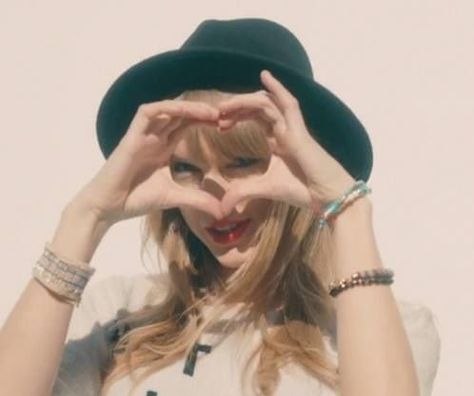 I pretty much freaked out when I watched the 22 music video for the first time and she did a hand heart! Taylor Swift, Swift, A Woman, Wall, Red, White