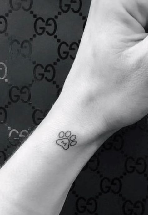 Mini Tattoos Dog Memorial, Dog Paw Tattoos For Women On Hand, Tattoo For Someone Who Saved You, Small Paw Print Tattoo With Initial, Symbolic Dog Tattoo, Dog Inspired Tattoos Simple, Small Dog Tattoos Memorial, Animal Tribute Tattoos, Small Tattoo For Dog