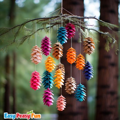 15+ Pine Cone Crafts and Decoration Ideas - Easy Peasy and Fun Painted Pine Cones Crafts, Decorative Arts Ideas, Cone Art Ideas, Pine Cone Mobile Diy, Diy Nature Crafts Decor, Pinecone Diy Crafts, Pine Cones Art, Decoration With Pine Cones, How To Decorate With Pine Cones