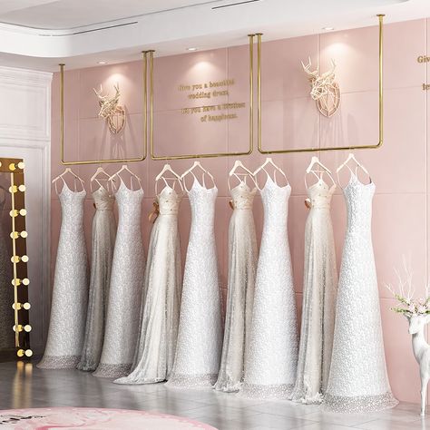 Bridal Store Gold Wall Mounted Wedding Dress Rack Boutique Garment Shop Wall Mounted Display Racks for Woman Clothes https://m.alibaba.com/product/1600501248738/Bridal-Store-Gold-Wall-Mounted-Wedding.html?__sceneInfo={"cacheTime":"1800000","type":"appDetailShare"} Bridal Store Interior, Dress Display Stand, Bridal Shop Interior, Bridal Shop Decor, Golden Ceiling, Bridal Shop Ideas, Wedding Dress Display, Dress Rack, Bridal Boutique Interior