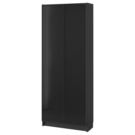 BILLY / HÖGBO Bookcase w glass doors, black-brown/black, 311/2x113/4x791/2" BILLY bookcase is a beloved icon that has many uses. HÖGBO door offers 4 expressions in 1 so you can choose the look – glass door, panel door or a personal expression with a photo, fabric or wallpaper. Bookcase With Glass Doors, Ikea Billy, Behind The Glass, Billy Bookcase, Panel Door, Tempered Glass Door, Design Line, Glass Cabinet Doors, Dream Apartment