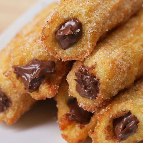 Chocolate Hazelnut Churros by Tasty Miam Churros Stuffed, Chocolate Churros, Chocolate Videos, Passover Desserts, Churros Recipe, Chocolate Hazelnut Spread, Chocolate Chocolate, Dessert Food, Chocolate Hazelnut