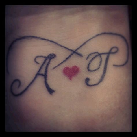 My 2nd tattoo. Mine & TJ's initials with a heart and infinity symbol on the inside of my wrist J And Heart Tattoo, A J Tattoo, J In A Heart Tattoo, J Infinity Tattoo, Cursive J Tattoo With Heart, J Tattoo Letter Heart, A And J Letters Love, A Love A Alphabet Wallpaper Letters, Infinite Love Tattoo