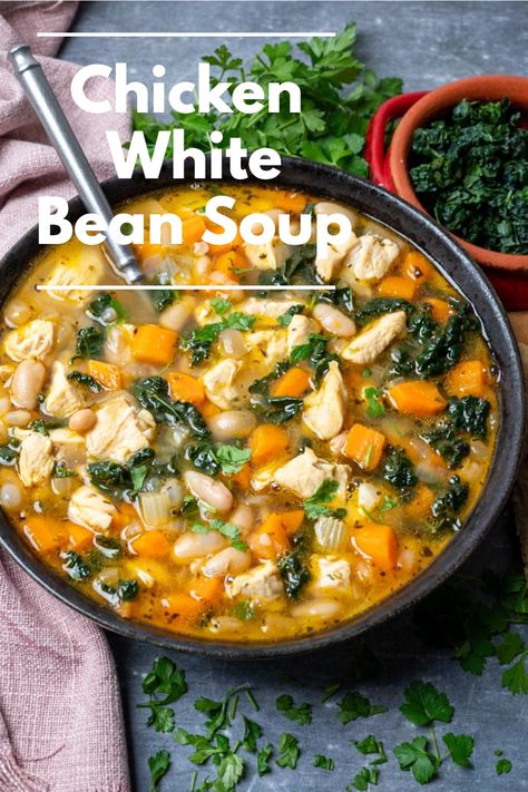 Enjoy this hearty chicken and white bean soup, a comforting recipe that combines nutritious beans with flavorful chicken, perfect for those chilly evenings. Chicken And White Bean Soup Recipes, Chicken White Bean Soup Instant Pot, Eating Well Slow Cooker Chicken And White Bean Stew, Chicken Kale And White Bean Soup, Soup Recipes White Bean, White Bean Chicken Soup Crock Pot, Chicken White Bean Spinach Soup, Instant Pot White Bean Soup Recipes, Hearty Chicken And Rice Soup