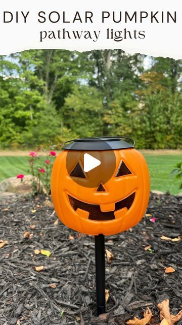 Courtney Hamilton on Instagram: "DIY solar pumpkin lights!  I used $1.98 pumpkin buckets and solar pathway lights for this project.  I made a small hole and cut a few slits in the bottom of the pumpkin and pushed the pathway light through it. (Make sure the hole is slightly smaller than the post to the light so the pumpkin doesn’t fall down). Stick in the ground and wait till you see how cute these are at night!  Remove the pumpkin after Halloween and use the pathway lights year round.  Comment PUMPKIN and I’ll message you the links to items I used.  Thanks for this great idea @kelsimsavage 🎃 #diy #halloween #halloweendiy #pumpkins #halloweendecor #falldecor #outdoorlighting #fall #falldecor #outdoor #halloweenideas 

Follow my shop @athomewiththehamiltons on the @shop.LTK app to shop thi Diy Lighted Outdoor Halloween Decorations, Solar Halloween Decorations, Pumpkin Yard Decorating Ideas, Pumpkin Decoration Outdoor, Plastic Pumpkin Over Solar Lights, Round Garden Ideas, Pumpkin Pathway Lights, Diy Outdoor Solar Lights, Diy Hanging Pumpkin Lanterns