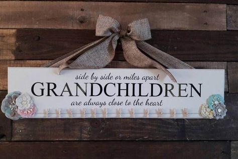 Grandkids sign, grandchildren are close to the heart, grandkids wooden sign, custom wooden signs, photo display, picture board by SixArrowsDesignCo on Etsy https://www.etsy.com/listing/510090094/grandkids-sign-grandchildren-are-close Grandma Diy, Grandkids Sign, Displaying Kids Artwork, Exposition Photo, Great Grandma Gifts, Picture Board, Wooden Signs Diy, Miles Apart, Custom Wooden Signs