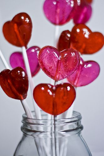 puffy heart shaped lollipops in pinks and fushias and reds. so perfect for valentines day. Love how shiny and vibrant they are Heart Shaped Lollipops, Kue Macaroon, I Love Heart, My Funny Valentine, Colorful Candy, Romantic Valentine, In A Jar, Candy Shop, Sweet Candy