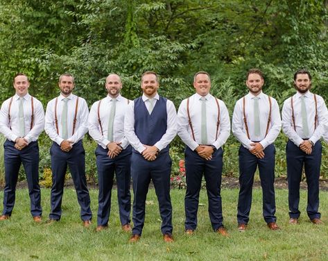 Suspenders With Jeans Wedding, Men In Suspenders Wedding, Navy Blue Pants Brown Suspenders Wedding, Men’s Wedding Party Attire, Summer Groomsmen Attire Navy, Suspenders Groomsmen Attire, Groom In Vest Groomsmen In Suspenders, Wedding Suit With Suspenders, Groomsman Attire Jeans