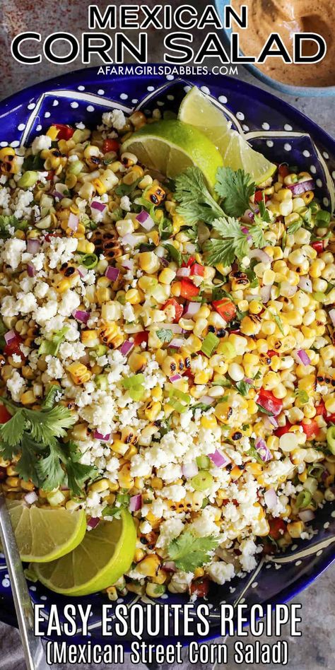 This Mexican Corn Salad, also known as esquites, is an easy recipe with BIG flavor. It features fresh sweet corn folded into a creamy, lime-spiked sauce that's flavored with simple spices. Crumbly, salty Cotija cheese finishes off the bowl - absolutely irresistible! Mexi Corn Salad, Recipe For Mexican Corn, Shoepeg Corn Salad Recipe, Mexican Sweet Corn, Esquites Recipe, Corn Salad Recipe Easy, Mexican Corn Recipes, Summer Entertaining Recipes, Mexican Street Corn Recipe