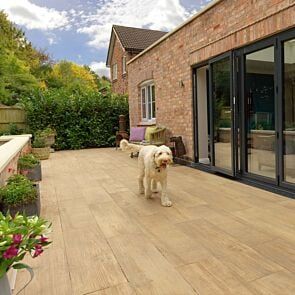 Wood Effect Paving Slabs | Wood Effect Porcelain | Paving Direct Timber Look Tiles Outdoor Patio, Wood Effect Porcelain Patio, Outdoor Wood Tiles, Outdoor Patio Flooring, Landscape Styles, Garden Kitchens, Porcelain Patio, Paving Tiles, Garden Patios