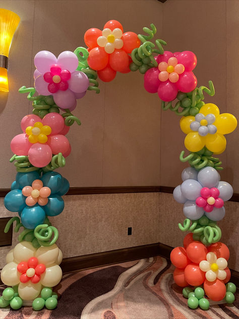 Spring Flower Balloon Arch, Balloon Flowers, Outdoor Balloon Arch, Flower Power Arch, Balloon Decoration Ideas Outdoor Balloon Arch, Flower Balloon Arch, Balloon Decoration Ideas, Grad Party Theme, Balloon Bouquet Delivery, Arch Balloon, Grad Party Decorations, Parade Float, Balloon Flowers