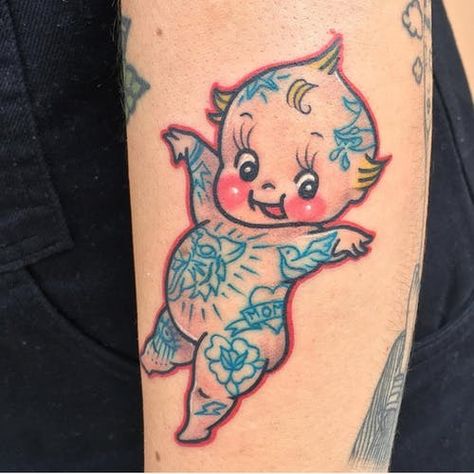 Tattoo uploaded by Tattoodo | Tattoo by Jori Lakars #JoriLakars #kewpietattoo #kewpiedolltattoo #kewpie #kewpiedoll #cutie #baby #tattooed #rose #heart #tiger #oldschool | 699727 | Tattoodo Traditional Kewpie Doll Tattoo, Traditional Baby Tattoo, Traditional Kewpie Tattoo, Traditional Tattoo Baby, Kewpie Tattoo, Kewpie Art, Baby Tattoo, Cherub Tattoo, Doll Tattoo