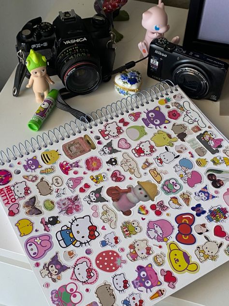 sticker collection notebook for school coquette hello kitty sanrio calico critter pusheen Ap Art Sketchbook Ideas, Decorating School Notebooks, Notebook Stickers Aesthetic, Sticker Notebook Cover, Decorated Notebooks, Sticker Notebook, Hello Kitty Scrapbook, Sticker Book Ideas, Hello Kitty Notebook