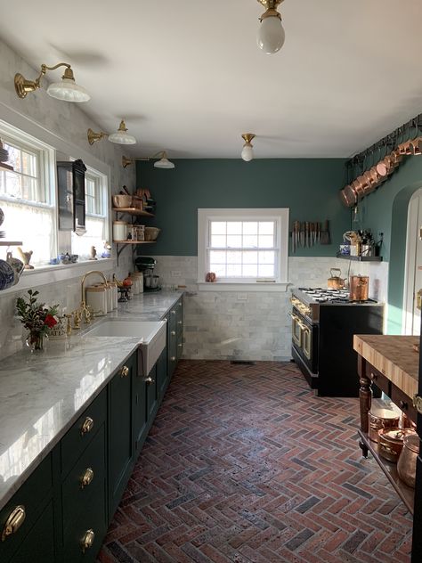 Green Cabinets Brick Floor, Green Kitchen Brick Floor, Moody Kitchen Tile Floor, Sage Green Kitchen Terracotta Floor, Brick Floor Kitchen Black Cabinets, Kitchen Floor Brick, Kitchen Flooring With Green Cabinets, Exposed Red Brick Kitchen, Subway Tile Kitchen Floor