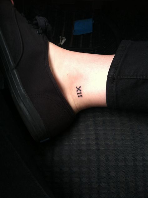 Roman numeral 12 tattoo XII 12 Tattoos, Roman Numeral Tattoos, Date Tattoos, 13 Tattoos, Skeleton Hand Tattoo, Ankle Tattoo, Little Tattoos, Trendy Tattoos, Small Tattoo