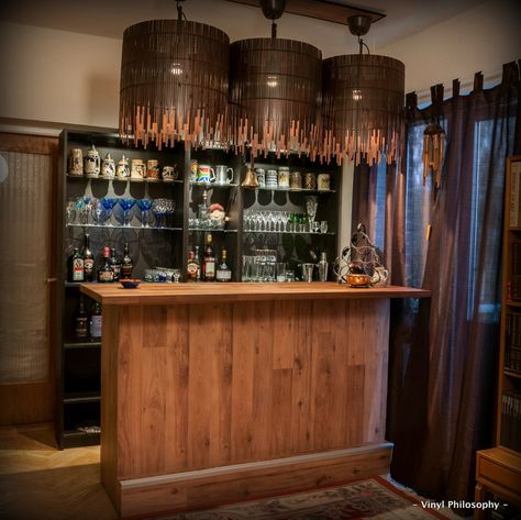 A gorgeous bar from tall and short BILLY bookcases. The tall ones form the storage cabinets for the bottles, nothing much hacked here. On to the bar counter … the bones are 2 shorter BILLY bookcases and a walnut kitchen counter also ordered from IKEA. To stabilize the structure, some 45mm x 75mm wooden beams purchased from [&hellip Build Your Own Bar, Ikea Billy Hack, Ikea Bar, Billy Ikea, Billy Bookcase Hack, Bookcase Bar, Ikea Billy Bookcase Hack, Bar In Casa, Diy Home Bar