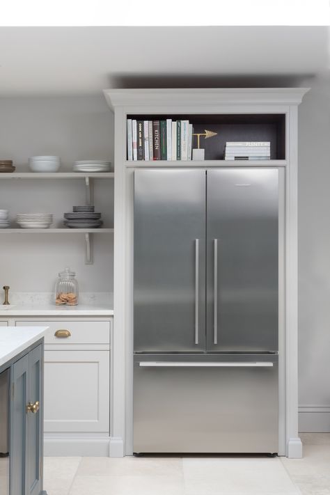 Fisher & Paykel fridge freezer housed in Nickleby cabinetry with storage space above for cookbooks. #humphreymunsonblog Fridge Nook, Above Fridge Storage, Fridge Surround, Contemporary Open Plan Kitchens, Above Fridge, Refrigerator Ideas, Humphrey Munson, Fridge Kitchen, Refrigerator Cabinet