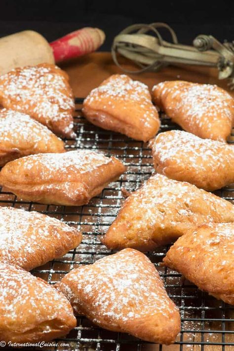 Rwandan donuts called Mandazi are a heavenly bite.  Seriously what is not to love about fried dough? Get the easy recipe and learn about the country. #mandazi #africandonuts #africancuisine #aficanfood #rwandanfood #rwandanrecipe #rwandancuisine #rwanda Mandazi Recipe, African Recipes Nigerian Food, African Dessert, Africa Food, African Cooking, Nigerian Food, Fried Dough, World Recipes, Donut Recipes