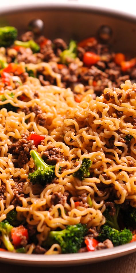 Beef Ramen Noodles Stir Fry is a quick budget-friendly way to use instant ramen! This healthy ramen noodles recipe is made with garlic, broccoli, soy sauce and more! Instead of using ramen soup packets, you will make quick homemade sauce, packed with flavor! Ingredients include: ground beef, onion, bell pepper, broccoli, ramen noodles, soy sauce, brown sugar, apple cider vinegar, smirch, garlic, scallion #beef #groundbeef #ramen #noodles #stirfry #broccoli #soysauce #lunch