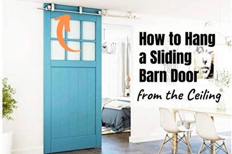 how to hang a sliding barn door from the ceiling Ceiling Mounted Door, Barn Door From Ceiling Hang, Hanging Barn Door From Ceiling, Ceiling Hung Barn Doors, Ceiling Mounted Barn Door, Top Ceiling Mount Barn Door, Folding Barn Door Celing Tracks, Interior Sliding Glass Doors, Hanging Barn Doors