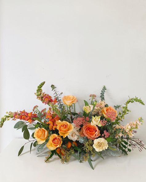 Orange Fall Centerpieces, Low Profile Floral Centerpieces, Horizontal Floral Design, Large Flower Centerpieces Wedding, Low Centerpieces Wedding Long Table, Orange Flower Table Arrangements, Long And Low Table Arrangement, Low Table Arrangements, Parallel Floral Arrangement