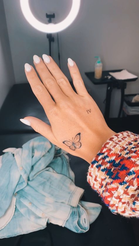 Butterfly hand tattoo Word Tattoos On Hand, Girly Hand Tattoos, Art Inspired Tattoos, Butterfly Hand Tattoo, Butterfly Tattoos For Women, Tattoos For Women Flowers, Healing Tattoo, Hand Tattoos For Women, Jesus Love