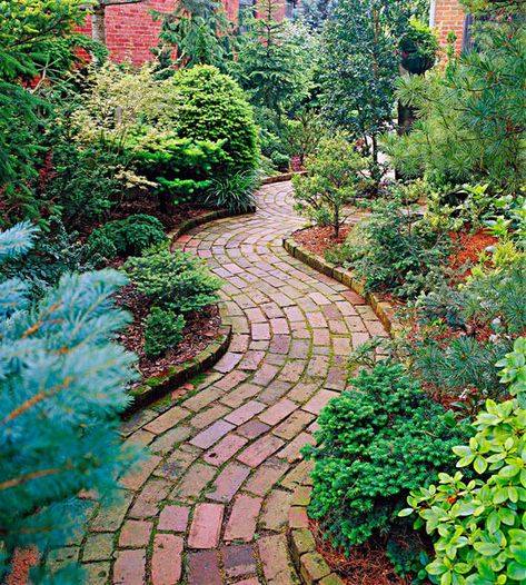 A curved pattern adds a sense of movement to this charming garden path. More glorious garden paths: http://www.bhg.com/home-improvement/outdoor/walkways/garden-paths/?socsrc=bhgpin060712 Brick Pathway, Brick Path, Brick Walkway, Walkways Paths, Garden Walkway, Have Inspiration, The Secret Garden, Charming Garden, Garden Pathway