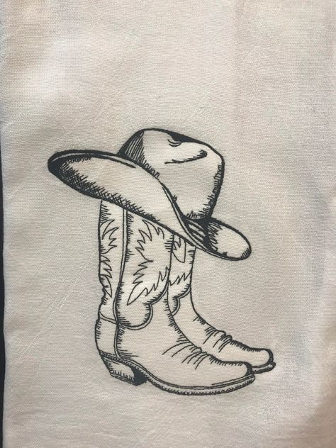 Embroidered flour sack towel with a sketch of cowboy boots and hat True to the character of real flour sack, there may be random colored threads in the weave...embrace the imperfections, it's all part of the charm. Cowboy Boots Drawing, Hat Sketch, Chestnut Springs Series, Cowboy Boot Tattoo, Cowboy Hat Tattoo, Cowgirl Tattoos, Cowboys Boots, Cowboy Tattoos, Chestnut Springs