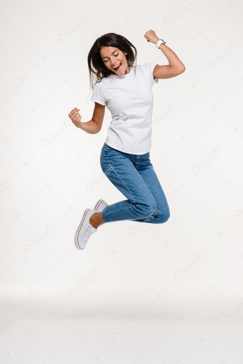 Free Photo | Portrait of a pretty joyful woman jumping Jumping Model Poses, Someone Jumping, Person Jumping, Joyful Woman, Force Activities, Jumping Pictures, Woman Jumping, Picture Of A Person, Fruits Design