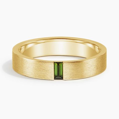 Men's 18K Yellow Gold Apollo Green Tourmaline 4.5mm Wedding Ring. This modern wedding band features a vertical baguette green tourmaline set in a matte brushed finish for a defining look. The softened inside edge provides increased comfort for daily wear. Mens Wedding Ring Unique, Luxury Men Rings, Mens Wedding Ring With Emerald, Man Wedding Ring With Diamonds, Mens Vintage Wedding Ring, Engagement Rings Guys, Men’s Wedding Bands With Stones, Mens Simple Wedding Bands, Cool Men’s Wedding Bands