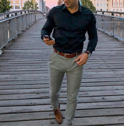 Grey Chino, black shirt, brown belt and shoes Spring Outfits Men Casual, Grey Pants Brown Shoes, Brown Shoes Outfit, Grey Chinos Men, Chinos Men Outfit, Mens Brown Dress Shoes, Brown Shoes Men, Shirt Outfit Men, Black Button Up Shirt