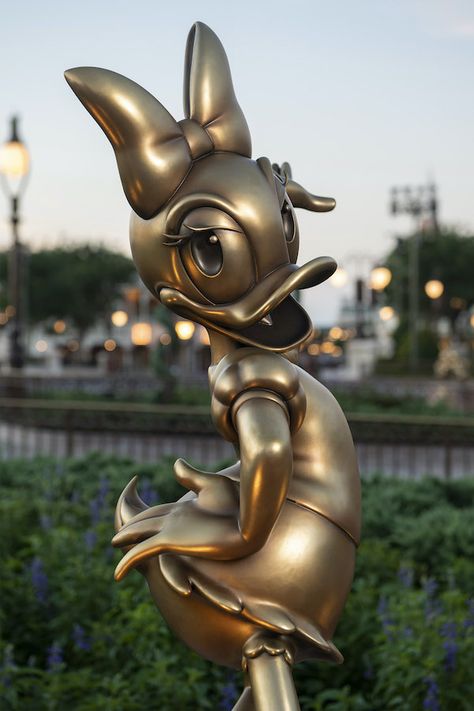 Disney World Adds New Decor For Its 50th Anniversary Celebration Walt Disney Paris, Disney Statues, Duck Statue, Disney Parade, Disneyland Pictures, 50th Anniversary Celebration, Disney World Florida, Disney Ornaments, Disney Day