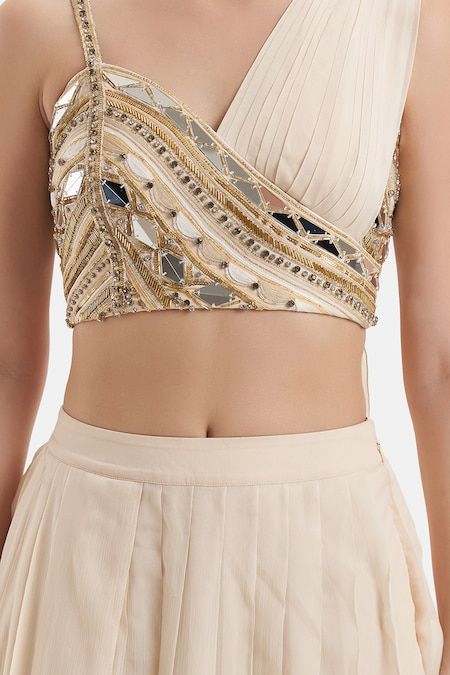 Buy Ivory Chiffon Hand Embroidered Mirror Asymmetric Neck Blouse And Skirt Set For Women by Divya Aggarwal Online at Aza Fashions. Stylish Embroidery Design, Draped Blouse Pattern, Mirror Beads, Trendy Outfits Indian, Lehenga Designs Simple, Latest Model Blouse Designs, Fashionable Saree Blouse Designs, Women Kurta, Padded Blouse