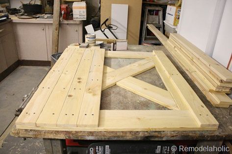 DIY dutch barn door Dutch Barn Door, Barn Door Baby Gate, Shed Landscaping, Doors Diy, Barn Door Designs, Smart Tiles, Diy Budget, Shed Doors, Into The Wood