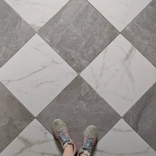 Using this Home Depot Alicante Grigio tile with the Bianco to create a checkerboard look in our flip house mu… | Checkered floors, Home design diy, Mudroom flooring Mudroom Plans, Mudroom Tile, Mudroom Flooring, Flip House, Checkerboard Floor, Coastal Dining, Mudroom Design, Home Design Diy, Laundry Mud Room