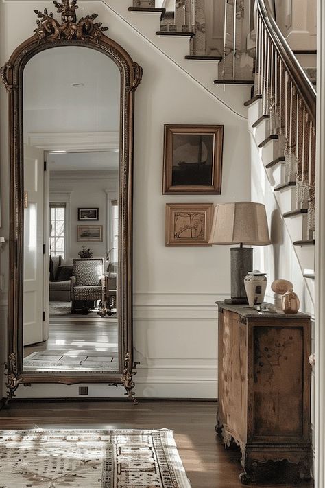 House Entryway Decor, Small French House Interior, Kos, Entryway Decor Under Stairs, Chairs In Foyer Entry Ways, Nancy Meyers Shelf Decor, Floor Mirror And Plant, Brownstone Foyer Entryway, Classic Southern Home Decor Entryway