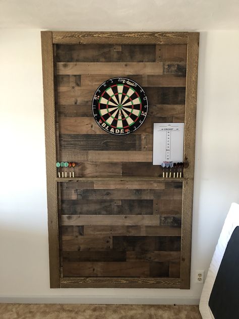 Man Cave Dart Board Ideas, Barnwood Dart Board Wall, Wood Dart Board Wall, Dart Board Wood Wall, Dart Board Area Ideas, Dartboard Wall Ideas, Wood Trim Basement, Dart Board Wall Ideas Diy, Basement Dart Board Wall