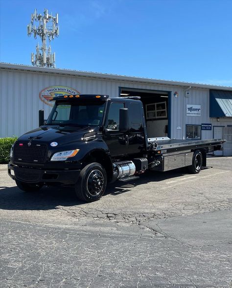 Can this black look anymore sleek? New 2024 “Blacked out” International MV equipped with a 12 Series LCG and optioned out for some sweet… | Instagram Obs Flatbed, Rollback Tow Truck, Dodge Stealth Twin Turbo, Navistar International, Flatbed Towing, Flatbed Trailer, International Harvester Truck, Flatbed 2nd Gen Dodge, Jacked Up Trucks